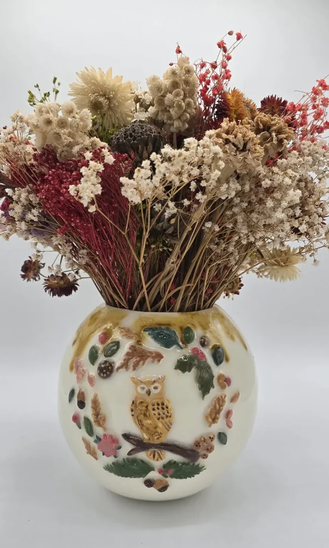 Vase habité par un hibou